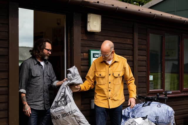 Hebtroco co-founders Ed Oxley, left, and Brant Richards, with their electric cargo delivery bike. Denim shirt, £135, and yellow overshirt, £175; selvedge jeans, £150.  Picture by Alex De Palma.