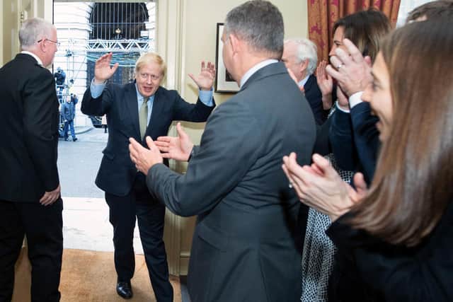 Boris Johnson returns to 10 Downing Street in triumph after winning the December 2019 election by 80 seats.