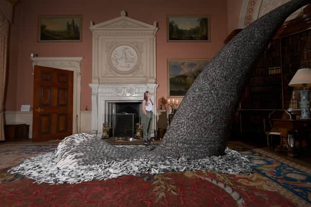 Exhibition by British artist Kate MccGwire at Harewood House. Bea Porter aged 10  looks at one of the sculptures. Picture by Simon Hulme