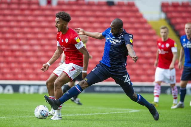Barnsley's Jacob Brown istackled by Forest's Samba Sow. (Picture: Tony Johnson)