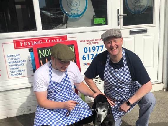 (left to right) Jonny Chapman, Charlie Tipton, the owner of Hillside Fisheries, with Gyp, the Whippet