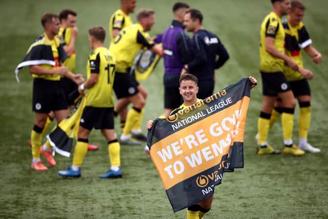 Harrogate Townâ€TMs Joshua Falkingham and his team-mates celebrate after winning the Vanarama National League play-off semi final match at CNG Stadium, Harrogate. PA Photo. Picture date: Saturday July 25, 2020. See PA story SOCCER Harrogate. Photo credit should read: Tim Goode/PA Wire. RESTRICTIONS: Editorial use only. No commercial use.
