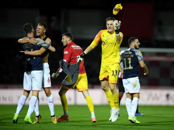 STAYING UP: Jack Walton celebrates survival at Brentford. Picture: Mike Hewitt/Getty Images.