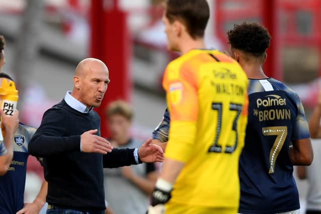 BELIEF: Gerhard Struber delivers instructions to his players during a drinks break at Brentford. Picture: Mike Hewitt/Getty Images.