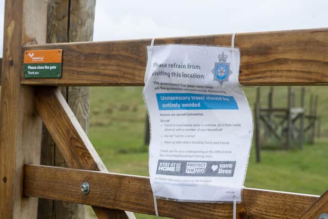 A notice from North Yorkshire Police in Malham warning visitors to stay away from the area during the lockdown