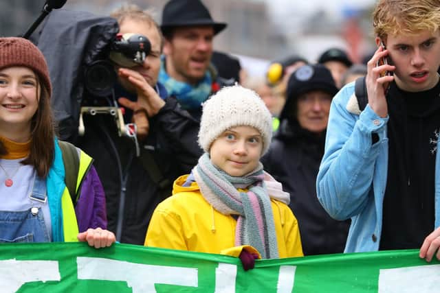 Teenage climate cange activist Greta Thunberg (centre).