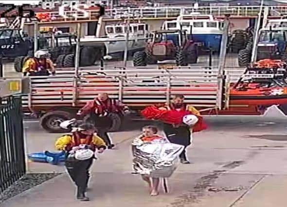 CCTV footage shows the girl returning to the lifeboat station