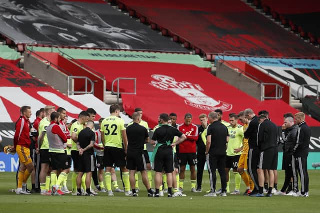Sheffield United's players and staff listen to Chris Wilder at the end of the game at St Mary's Stadium. Picture: Simon Bellis/Sportimage