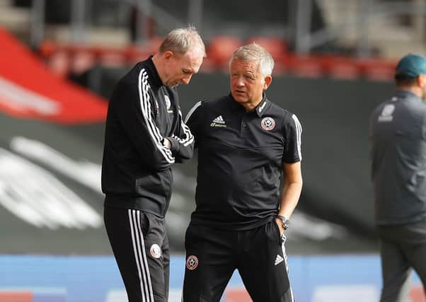 Sheffield United's Chris Wilder lchats with assistant Alan Knill at St Mary's Stadium on Sunday. Picture: David Klein/Sportimage