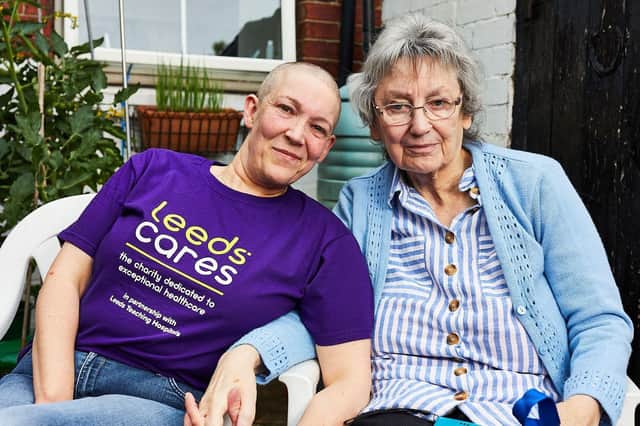 Barbara Wilson with her daughter Emma who had her head shaved to say thanks to the doctors who saved her mum's life Picture: David Lindsay