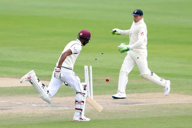 West Indies' Roston Chase (left) is run out by England's Dom Bess during day five of the Third Test at Emirates Old Trafford, Manchester. PA Photo. Issue date: Tuesday July 28, 2020. See PA story CRICKET England. Photo credit should read: Martin Rickett/NMC Pool/PA Wire. RESTRICTIONS: Editorial use only. No commercial use without prior written consent of the ECB. Still image use only. No moving images to emulate broadcast. No removing or obscuring of sponsor logos.