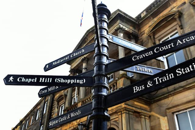 A signpost on Skipton Town Hall - but what is the future of Yorkshire's market towns?