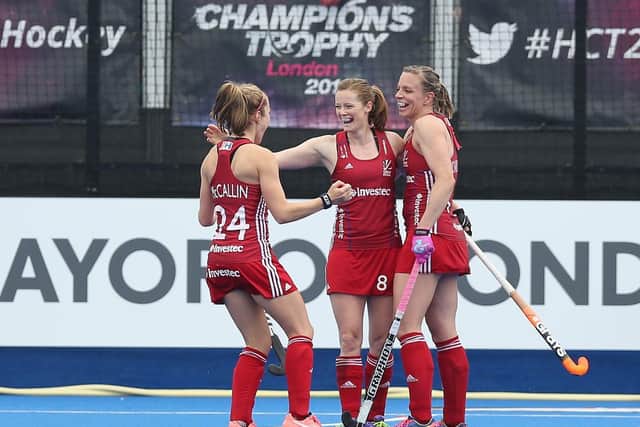 Helen Richardson-Walsh of Great Britain (C) and Kate Richardson-Walsh (R) celebrates after scoring their second goal during the FIH Women's Hockey Champions Trophy match between Argentina and Great Britain at Queen Elizabeth Olympic Park on June 18, 2016 in London, England.  (Photo by Alex Morton/Getty Images)