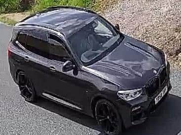 Police have issued a picture of a black BMW 4x4 captured on CCTV they are attempting to trace