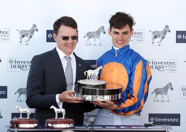 Donnacha O'Brien (right) with his father Aidan after teaming up to win the 2018 Epsom Oaks with Forever Together. Now they're rivals - as trainers.