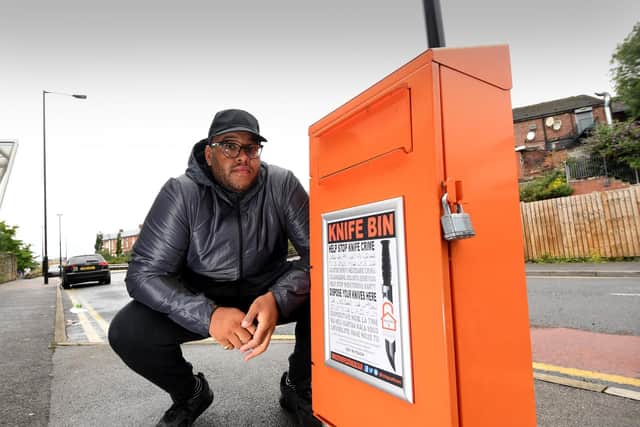 Anti-knife crime campaigner Anthony Olaseinde, who has organised bins for people to hand in their knives in Sheffield. Picture: Simon Hulme