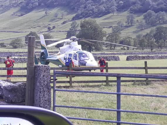 The air ambulance landed at Starbotton after the couple were attacked by a cow
