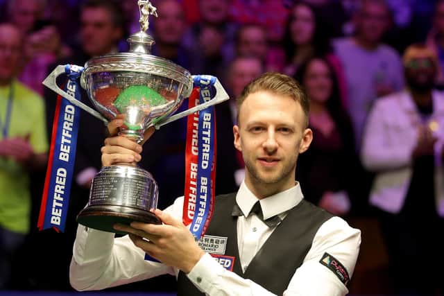 THE MAN TO BEAT: Judd Trump celebrates with the trophy after winning the 2019 World Championship at The Crucible,. Picture: Richard Sellers/PA