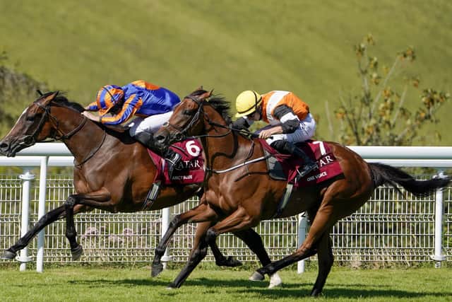 Fancy Blue ridden by Ryan Moore (left) wins The Qatar Nassau Stakes during day three of the Goodwood Festival at Goodwood Racecourse, Chichester. PA Photo. Issue date: Thursday July 30, 2020. See PA story RACING Goodwood Photo credit should read: Alan Crowhurst/PA Wire. RESTRICTIONS: Editorial Use, No Commercial Use.