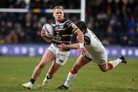 STICKING AROUND: Leeds Rhinos' Brad Dwyer, seen above being tackled by Toronto's Jon Wilkin, has signed a deal keeping him at Headingley until the end of 2022. 
Picture: Jonathan Gawthorpe