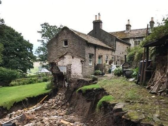 Grinton resident Chris Atkins damaged home following the floods.