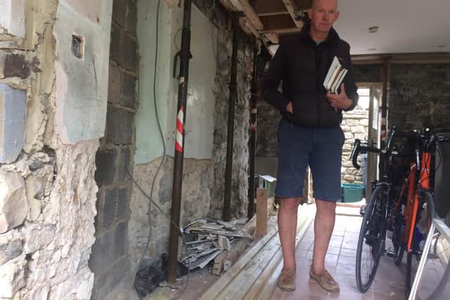 Ian Dawson, whose home in Reeth remains gutted 12 months on from the floods.