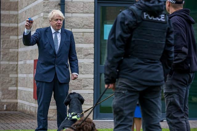 Prime Minister Boris Johnson is introduced to recently graduated Police Officers during a visit to North Yorkshire Police headquarters, Northallerton. Photo credit should read: Charlotte Graham/Daily Telegraph/PA Wire
