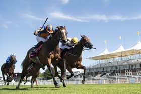 Fancy Blue ridden by Ryan Moore (left) wins The Qatar Nassau Stakes during day three of the Goodwood Festival at Goodwood Racecourse, Chichester. PA Photo. Issue date: Thursday July 30, 2020. See PA story RACING Goodwood Photo credit should read: Edward Whitaker/PA Wire. RESTRICTIONS: Editorial Use, No Commercial Use.