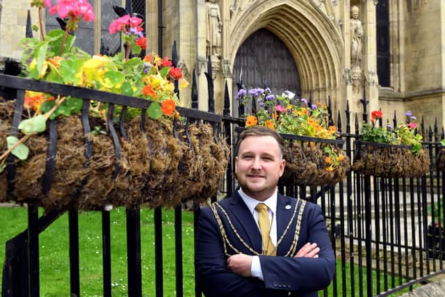 Tom Astell, Beverley's youngest ever Mayor, oustide the Minster