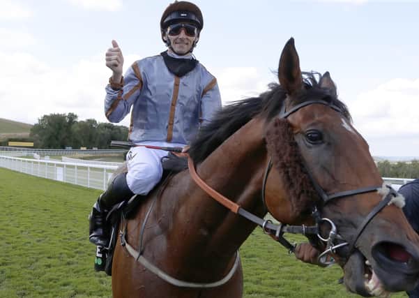 Summerghand ridden by Daniel Tudhope after winning the Unibet Stewards' Cup  during day five of the Goodwood Festival.
