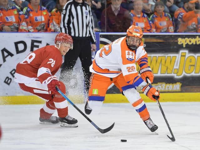 HIGH AMBITIONS: Defenceman Jordan Griffin, right, in action for Sheffield Steelers. Picture courtesy of Dean Woolley.