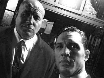 Adam with Hollywood superstar Tom Hardy on the set of Legend