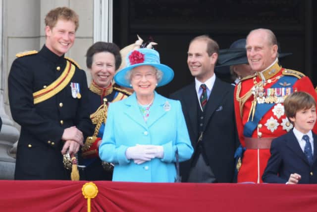 Prince Harry, Princess Anne, Princess Royal, Prince Edward, Earl of Wessex, Sophie, Countess of Wessex, HM Queen Elizabeth II and HRH Prince Philip, Duke of Edinburgh, laugh before watching a fly-past over Buckingham Palace after the Trooping the Colour ceremony on June 13, 2009 in London.  (Photo by Chris Jackson/Getty Images)