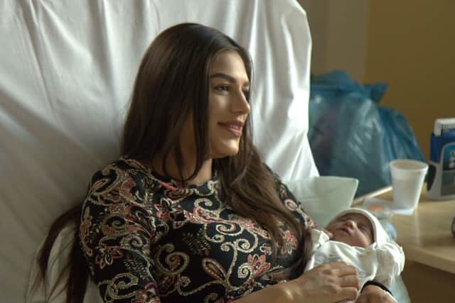 Mania Mahmood, who features in the documentary, with baby Hanna.
