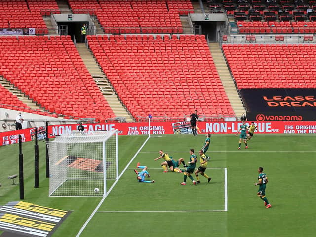 SWEET MEMORIES: Harrogate Town's George Thomson scores his side's first goal against Notts County at Wembley Stadium. Picture: Catherine Ivill/Getty Images
