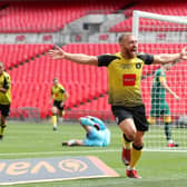 MAN OF THE MOMENT: George Thomson celebrates scoring Haoorgate Town's first goal against Notts County at Wembley Stadium. Picture: Catherine Ivill/Getty Images