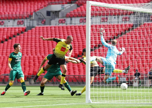DOUBLE THE TROUBLE: Harrogate Town's Connor Hall scores his side's second goal against Notts County on their way to winning the National League Play Off Final 3-1 at Wembley Stadium. Picture: Catherine Ivill/Getty Images
