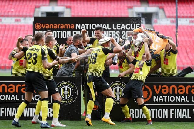 WE'RE GOING UP: Josh Falkingham of Harrogate Town's players celebrate winning the National League Play Off Final against Notts County at Wembley Stadium. Picture: Catherine Ivill/Getty Images