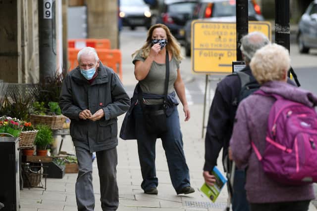 Shoppers wearing face masks in Hebden Bridge.
