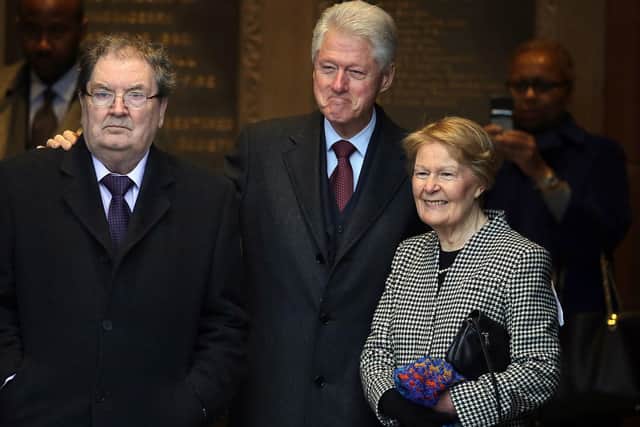 John hume and his wife Pat with President Bill Clinton.
