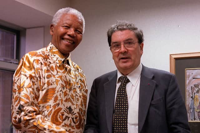 This was John hume with fellow Nobel Peace Prize winner Nelson Mandela.