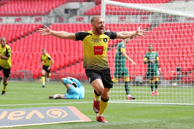 ON TARGET: Harrogate Town's George Thomson celebrates scoring his team's first goal against Notts County at Wembley Stadium. Picture: Catherine Ivill/Getty Images