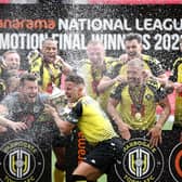 Harrogate Town celebrate promotion to the Football League.