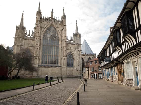Police are investigating after two men climbed scaffolding at York Minster and damaged historic masonry and other parts of the grade-1 listed building.  Photo credit:  OLI SCARFF/AFP via Getty Images