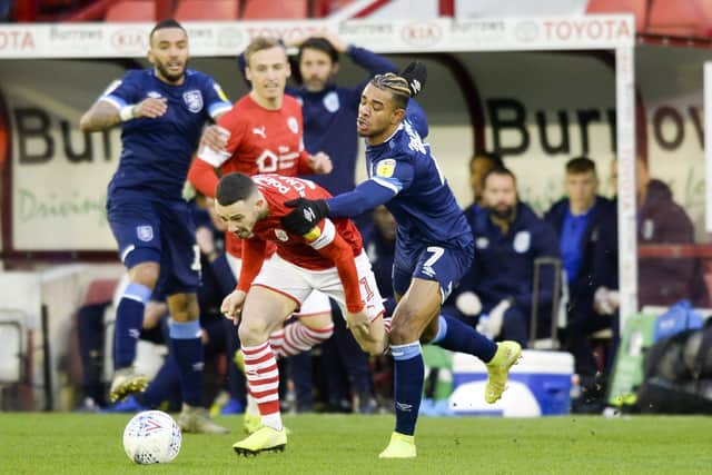 Barnsley's Conor Chaplin is brought down by Junnho Barcuna of Huddersfield Town (Picture: Dean Atkins)