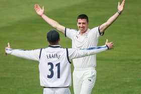 Yorkshire’s Matthew Fisher celebrates with Will Fraine after taking the wicket of Durham’s Alex Lees. Pictures: Alex Whitehead/SWpix.com