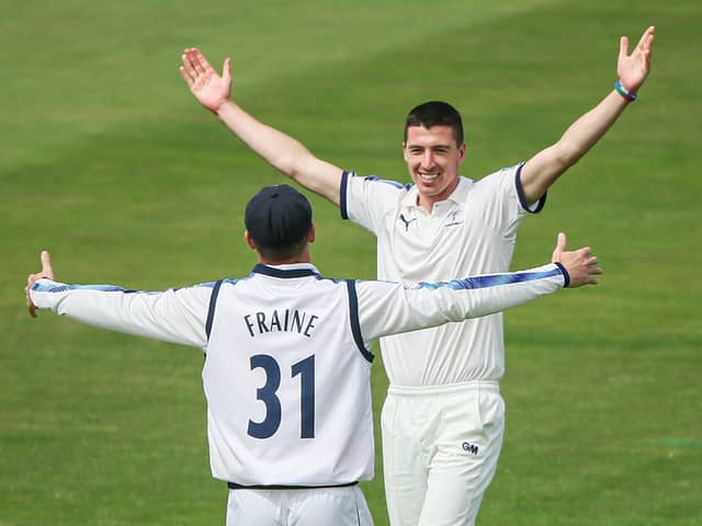 Yorkshire’s Matthew Fisher celebrates with Will Fraine after taking the wicket of Durham’s Alex Lees. Pictures: Alex Whitehead/SWpix.com
