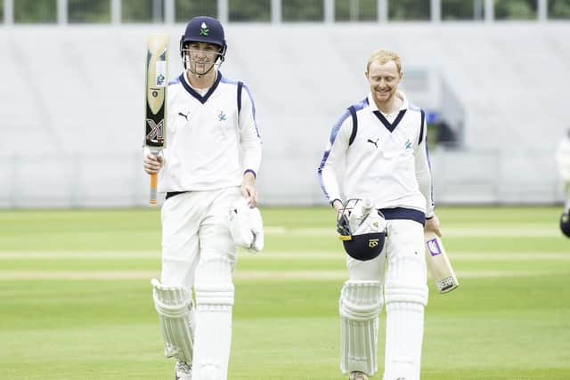 Yorkshire's Jonathan Tattersall and Harry Brook celebrate victory over Durham.