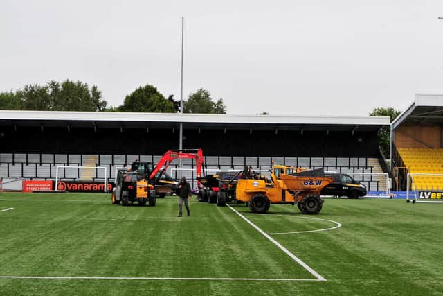 NEW PITCH: Work began on removing Harrogate Town's aritifical playing surface on Tuesday