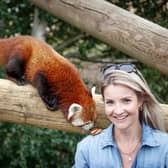 Countryfile presenter Helen Skelton feeds a red panda during a visit to the Yorkshire Wildlife Park in Doncaster to open two new expanded animal reserves: